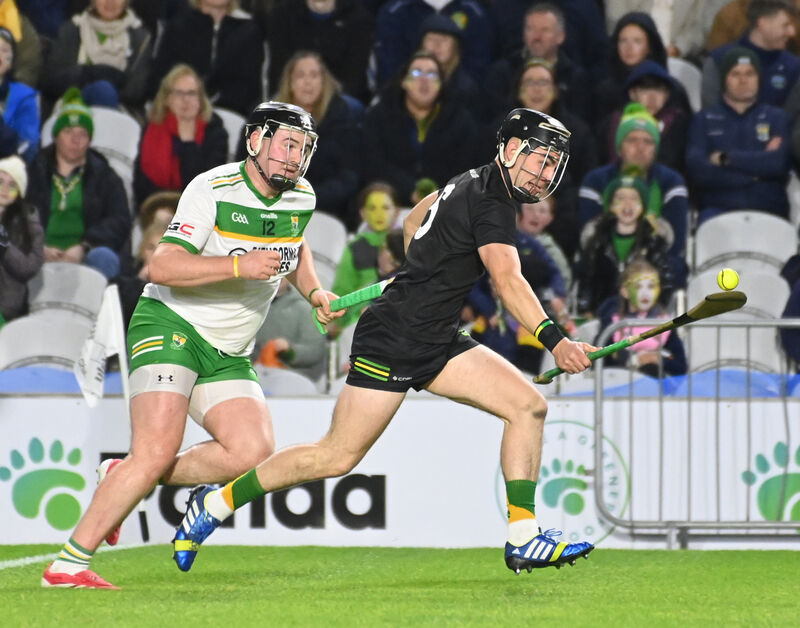 Castlelyons' Dara Spillane racing away from Adam Walsh of Bride Rovers. Picture: Eddie O'Hare