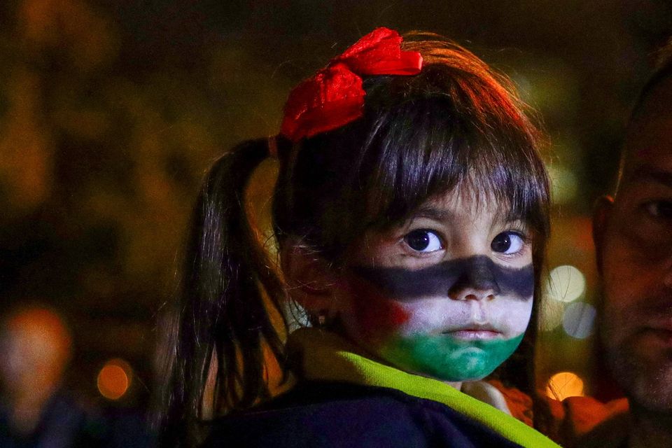 A girl, with a Palestinian flag painted on her face, takes part in a protest after Israel intercepted some of the vessels of the Global Sumud Flotilla aiming to reach Gaza and break Israel's naval blockade, in front of the U.S. Embassy in Ankara, Turkey, October 2, 2025. REUTERS/Efekan Akyuz     TPX IMAGES OF THE DAY     