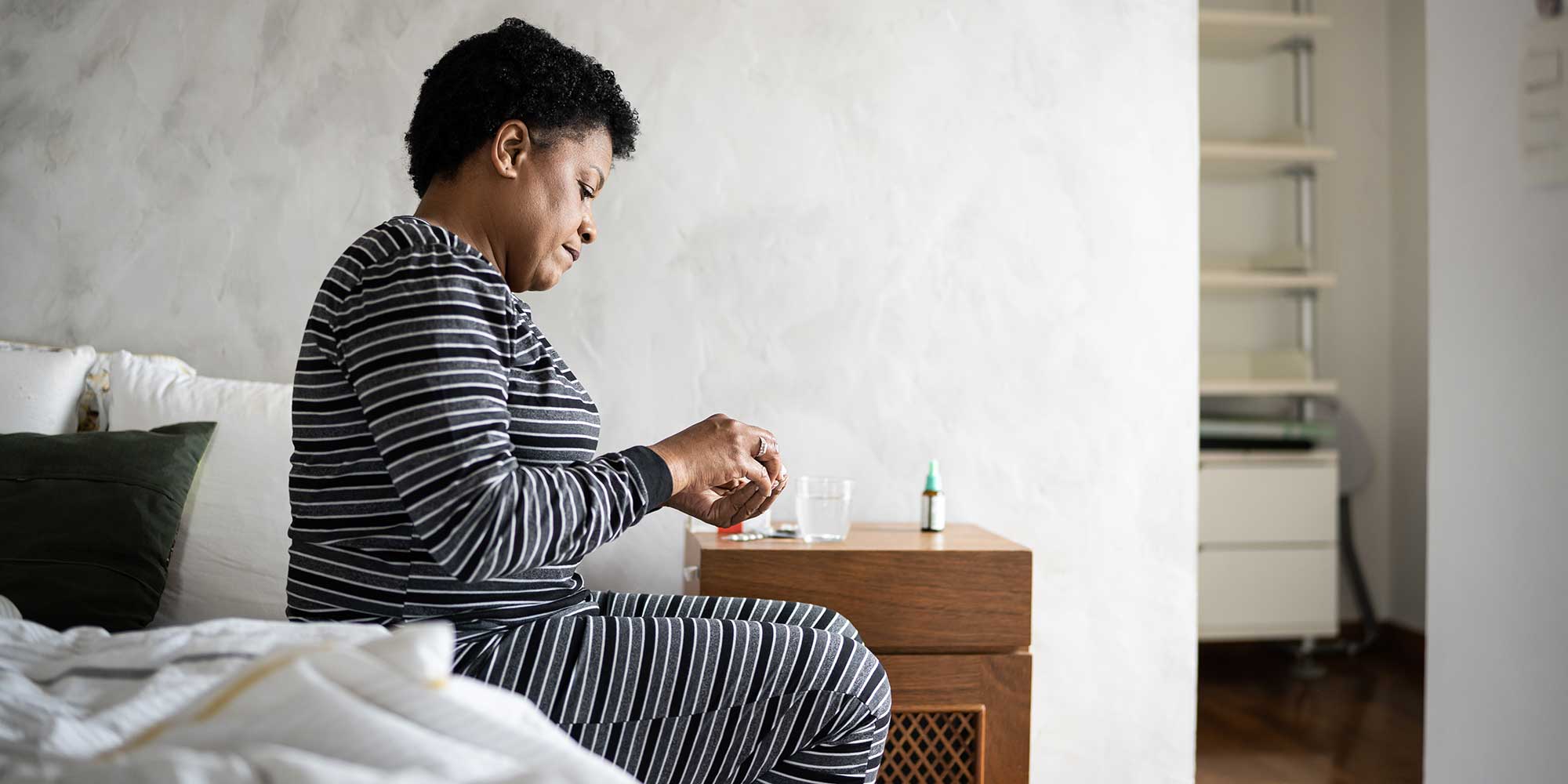 woman taking magnesium before bed