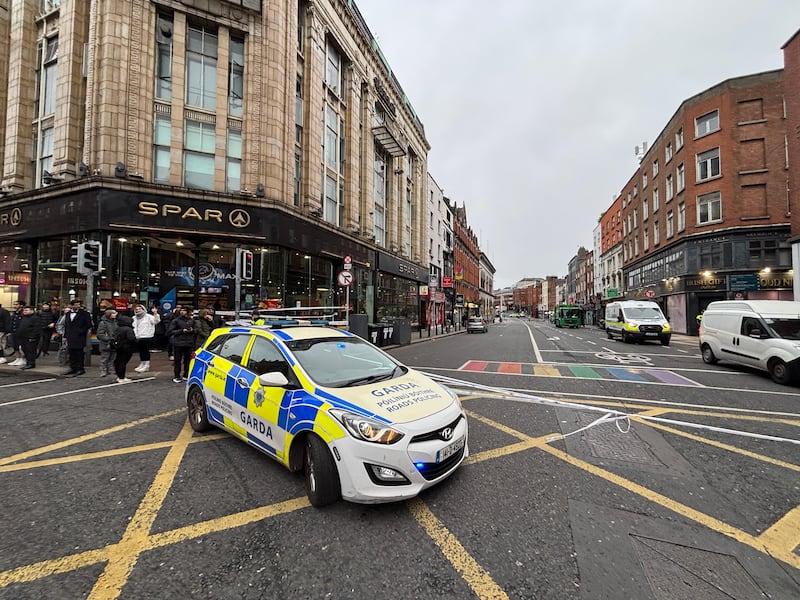 Gardaí closed a section of Dublin's Dame Street following an early-morning collision involving a bin lorry. Photograph: Bryan O'Brien