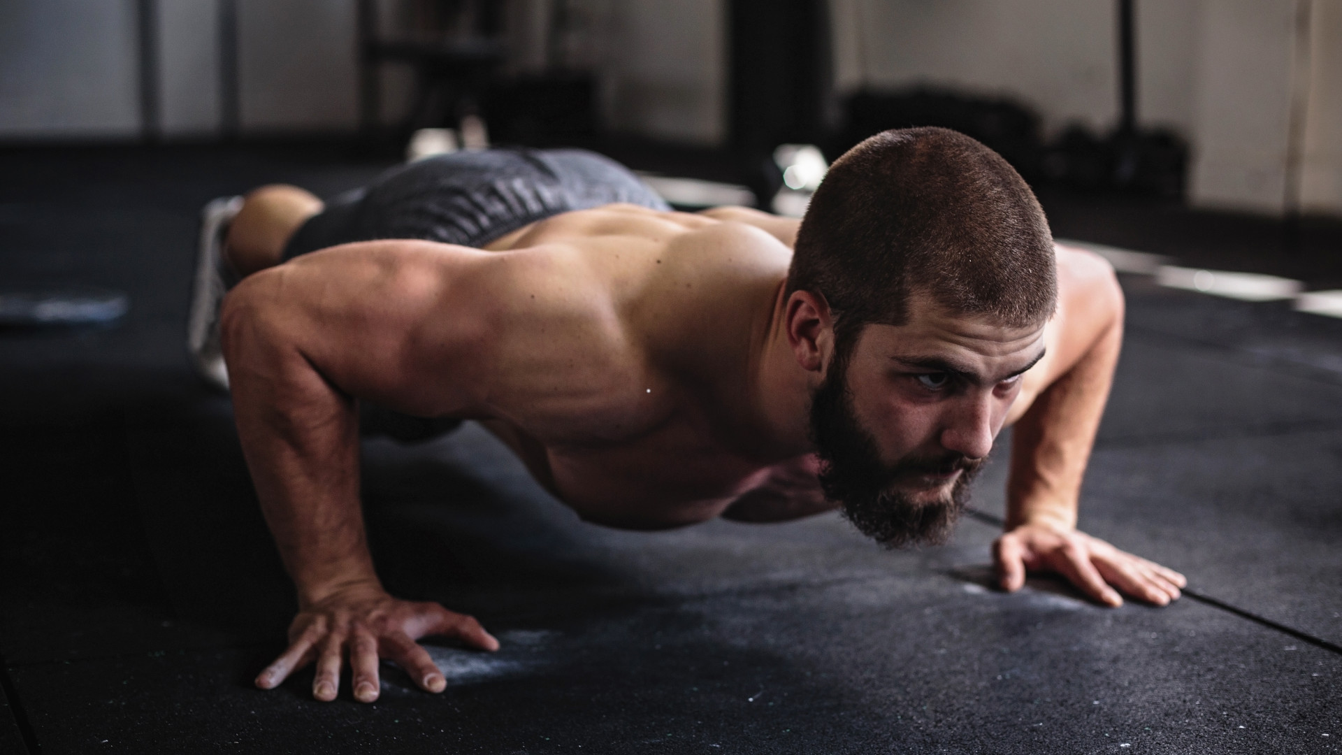a man performing push ups