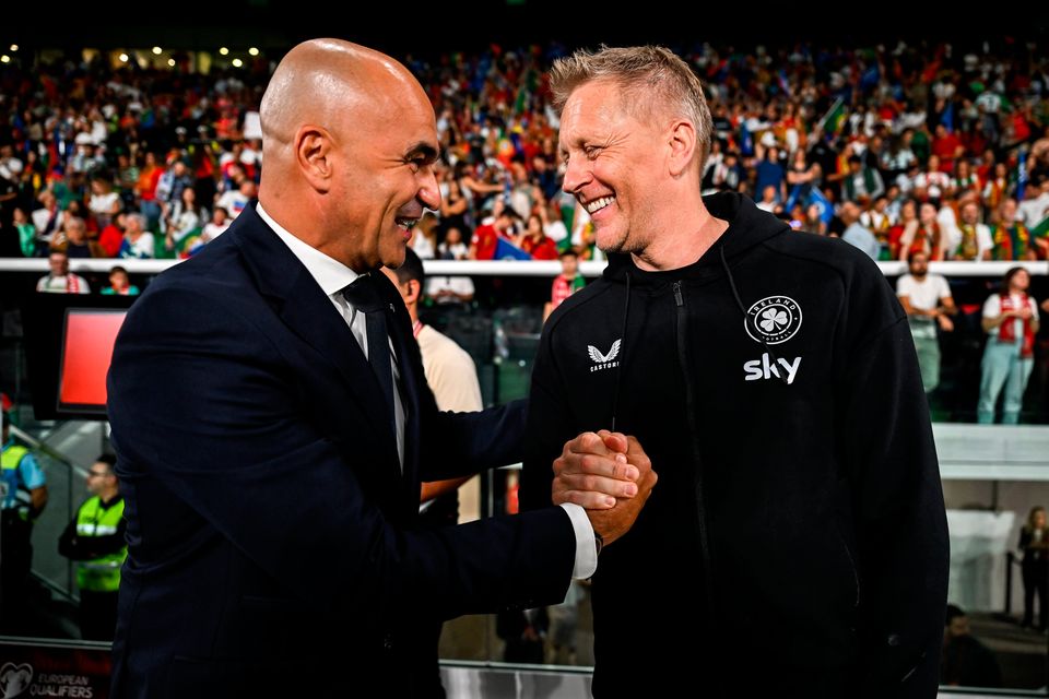 Republic of Ireland head coach Heimir Hallgrimsson, right, and Portugal head coach Roberto Martínez. Photo by Stephen McCarthy/Sportsfile