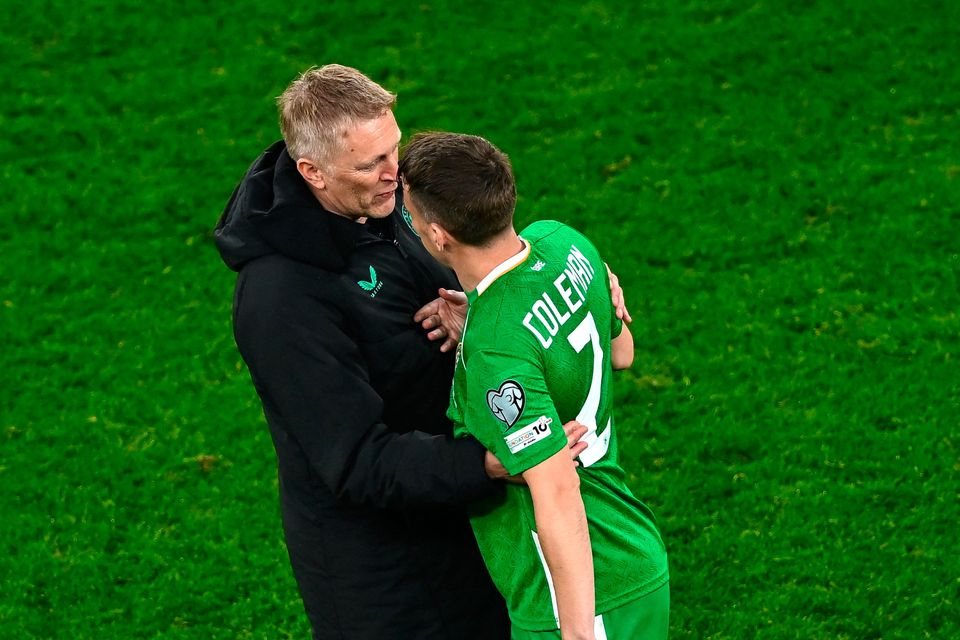 Ireland head coach Heimir Hallgrimsson, left, and Seamus Coleman after their side's victory