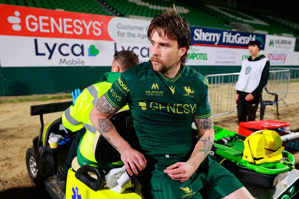 Mack Hansen of Connacht is transported off the pitch after picking up an injury during the United Rugby Championship loss to Bulls at Dexcom Stadium in Galway. Photo by Thomas Flinkow/Sportsfile