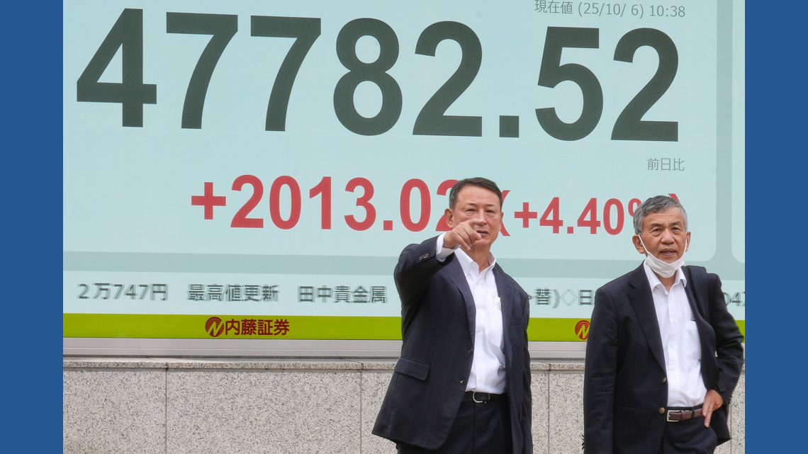 Asian markets mostly higher in quiet holiday trading after AI deals push Wall St to more records