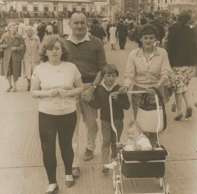 Rebecca, centre, with her mum, dad and two sisters