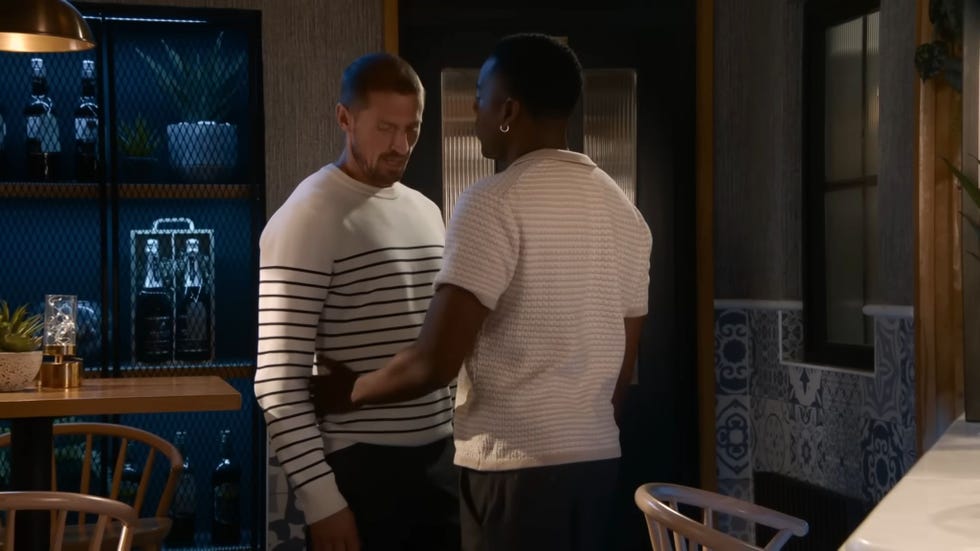 coronation street, carl webster and james bailey getting close in the bistro