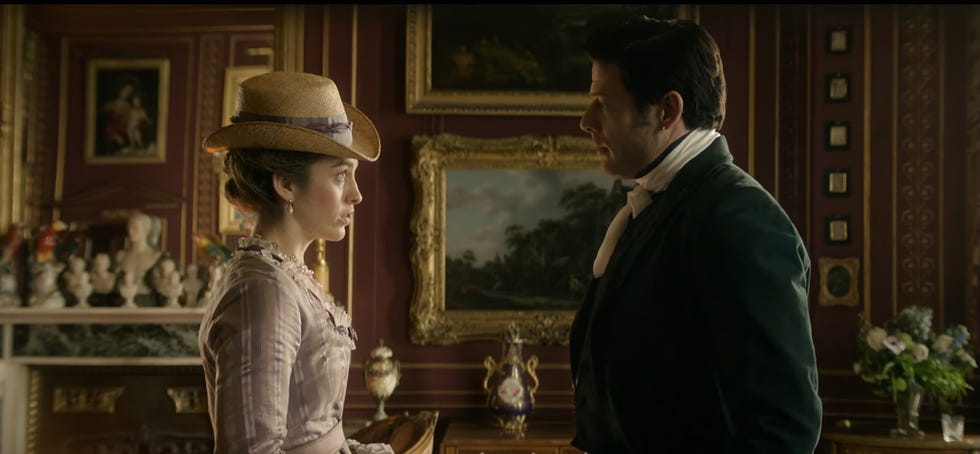 danielle galligan and james norton as olivia and rafferty sharing an awkward look in house of guinness