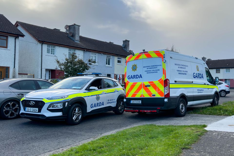 Gardaí and forensic collision investigators at the scene of a road crash in Jobstown, Dublin. Photo: Damien Storan