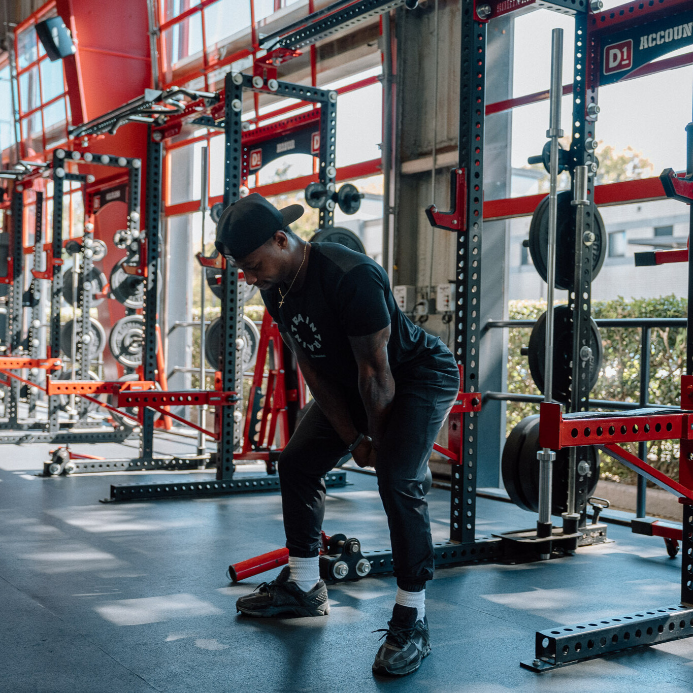 Man demonstrates kettlebell exercise in gym