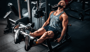 A man on the leg extension machine