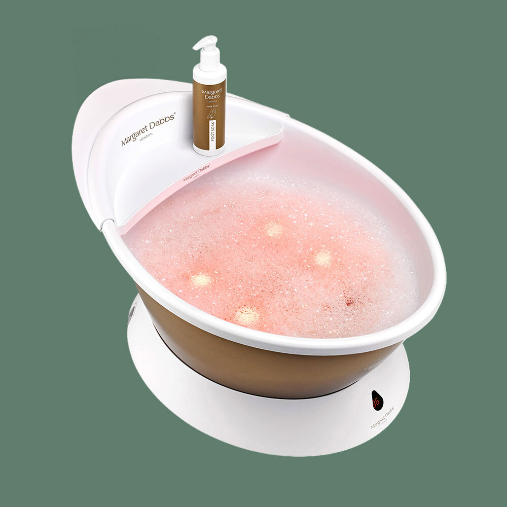 Foot spa with bubbling water and foot soak.