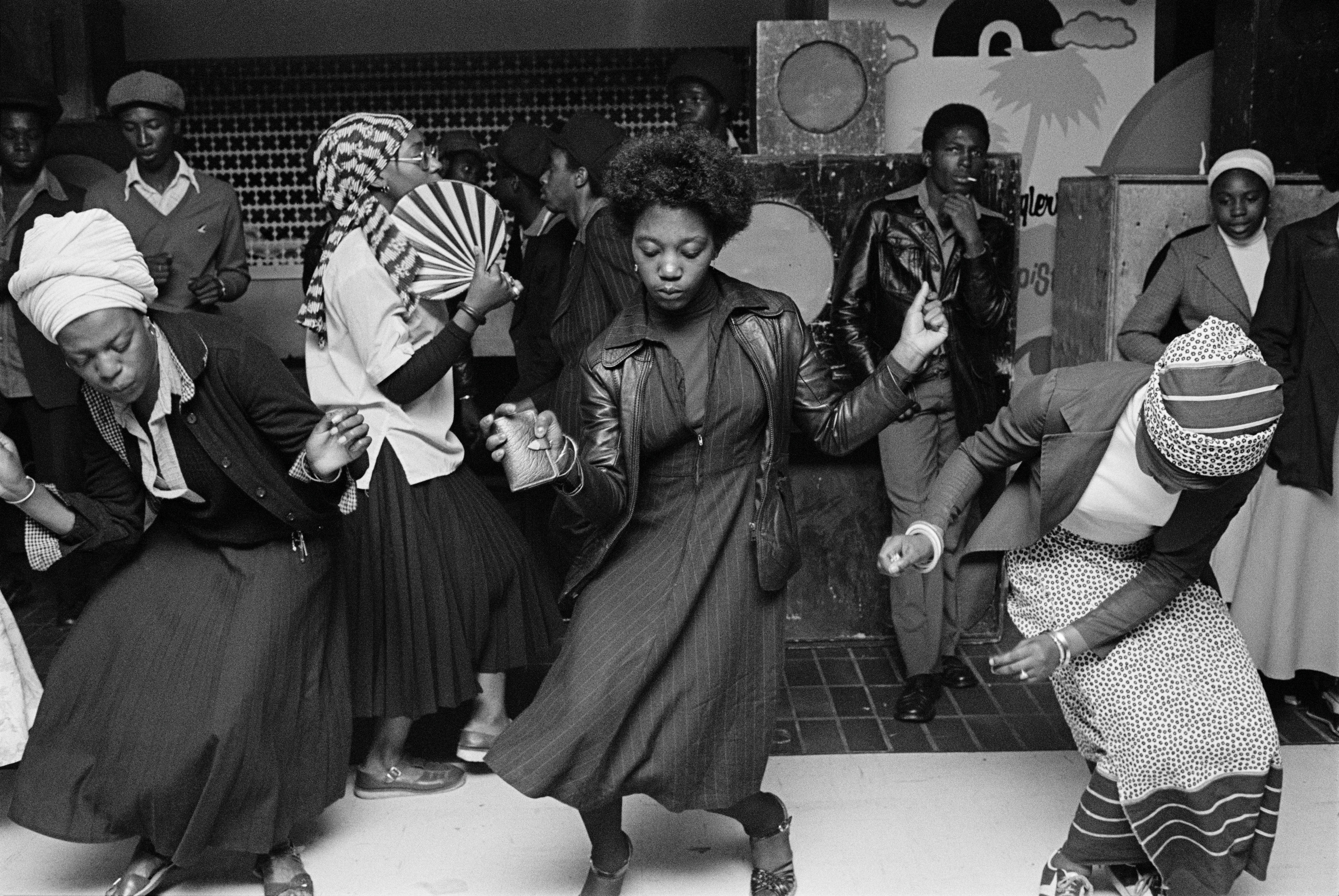 Black and white photo of people disco dancing in Wolverhampton, England, in 1978.