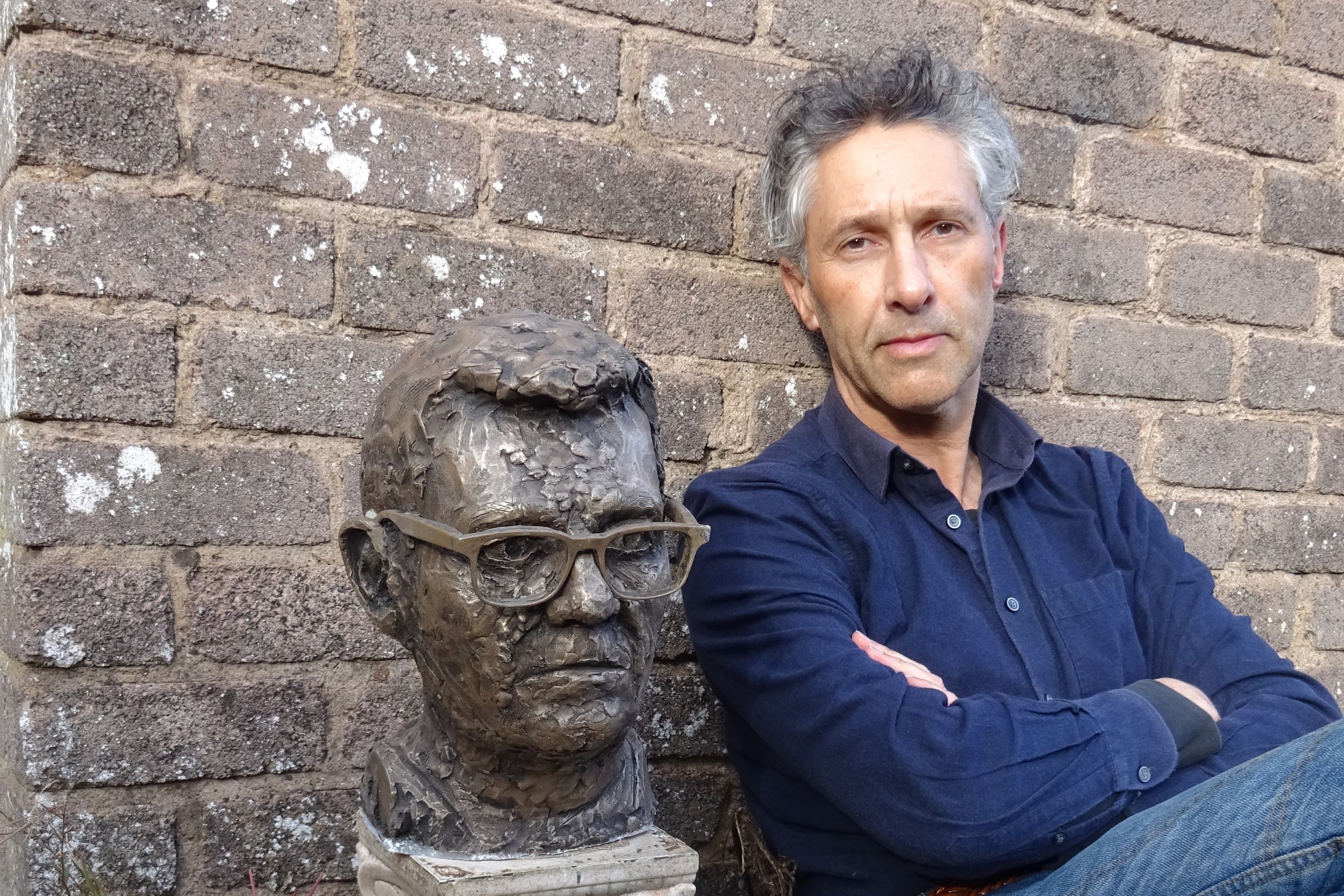 Artist Anthony D Padgett with his bronze bust of Andy Burnham.