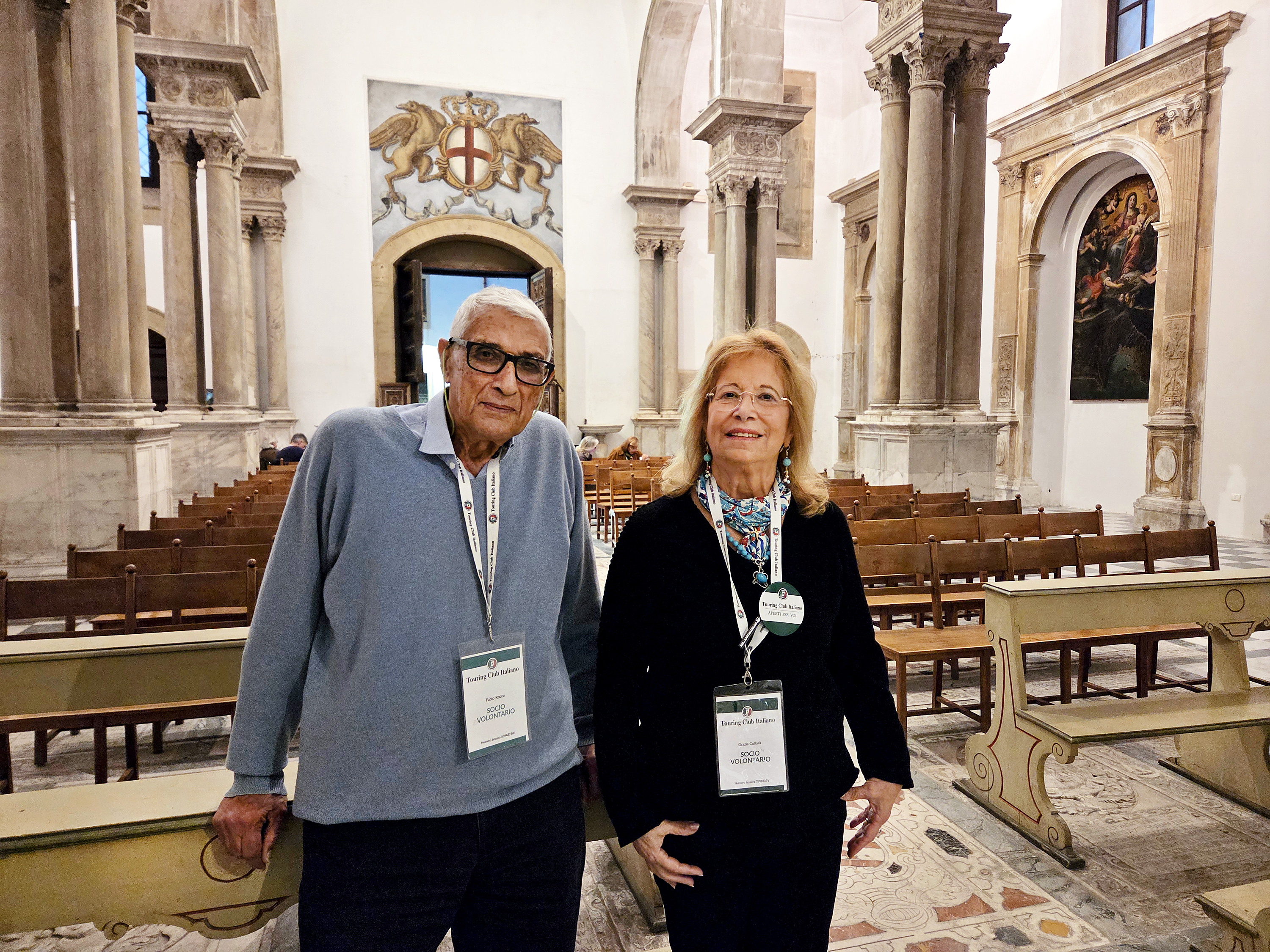 Fabio Rocca and Grazia Collora, volunteers for the Palermo church, in the church nave.