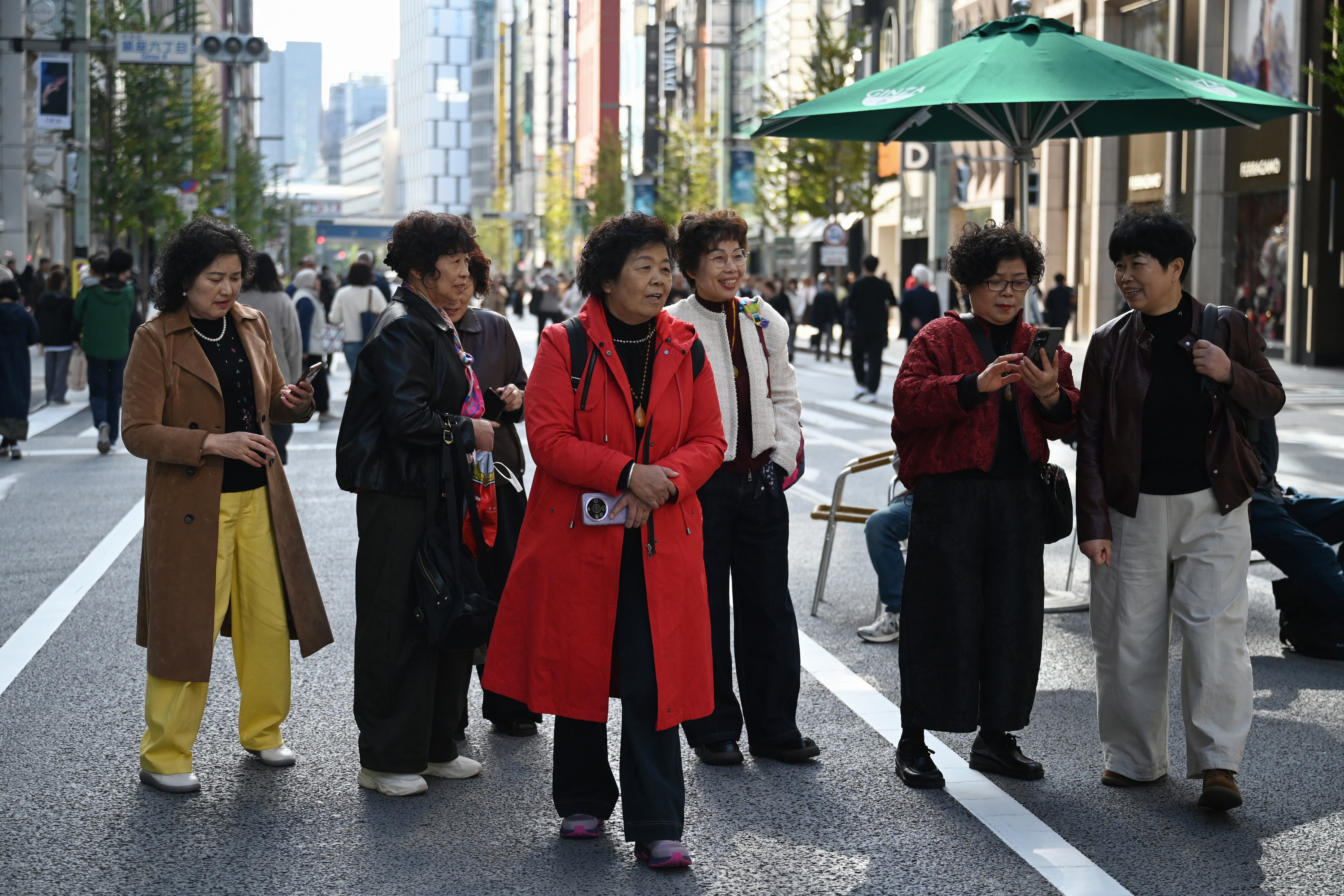 Chinese tourists visit the Ginza shopping district of Tokyo