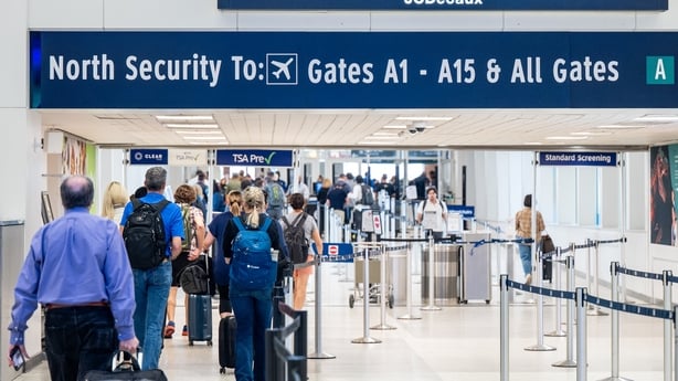 People walk through a terminal at the George Bush Intercontinental Airport in Texas.