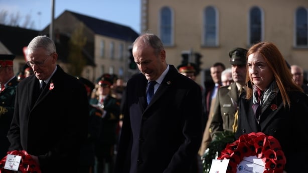 Northern Ireland Secretary Hilary Benn and Taoiseach Micheal Martin attend Remembrance service in Enniskillen