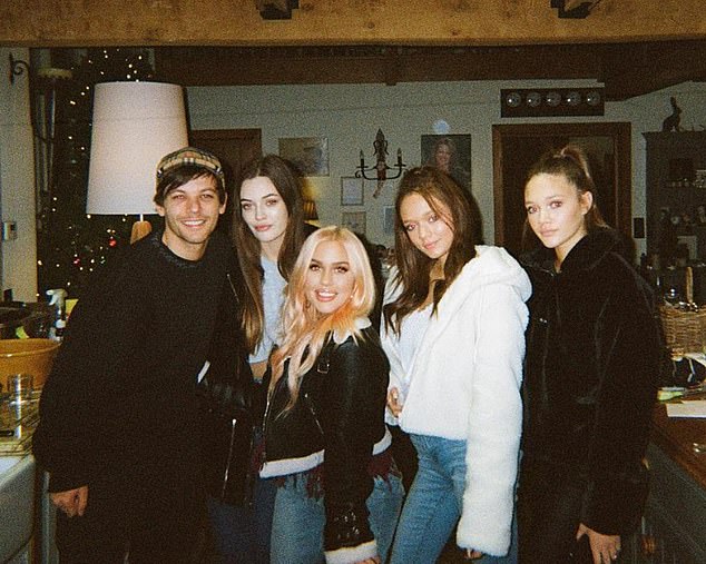 Louis, found fame on The X Factor back in 2010 alongside bandmates Harry Styles, Liam Payne, Niall Horan and Zayn Malik and was catapulted to overnight success (L-R  Louis with sisters Felicite, Lottie, Phoebe and Daisy in 2018)