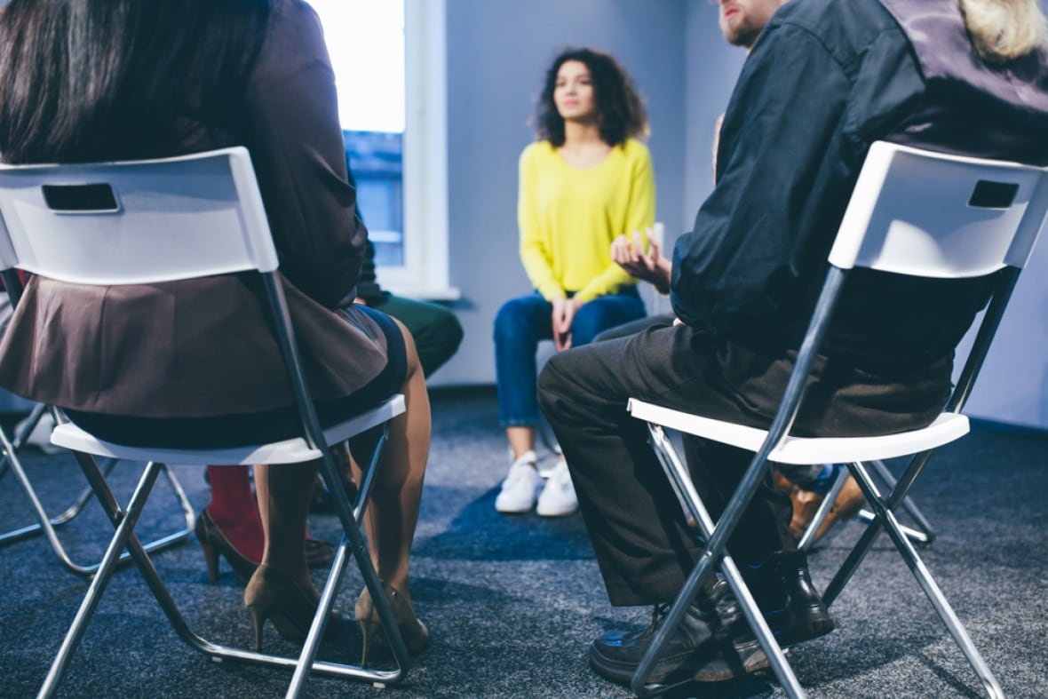 People having group therapy