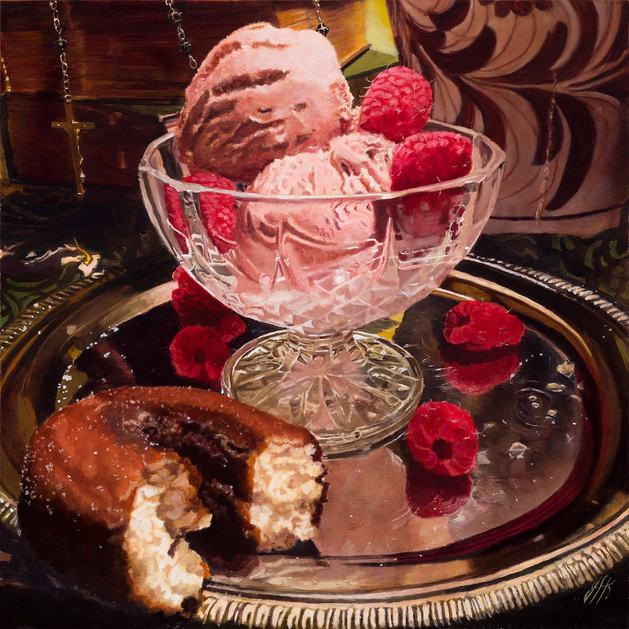 A bowl of ice cream and a doughnut