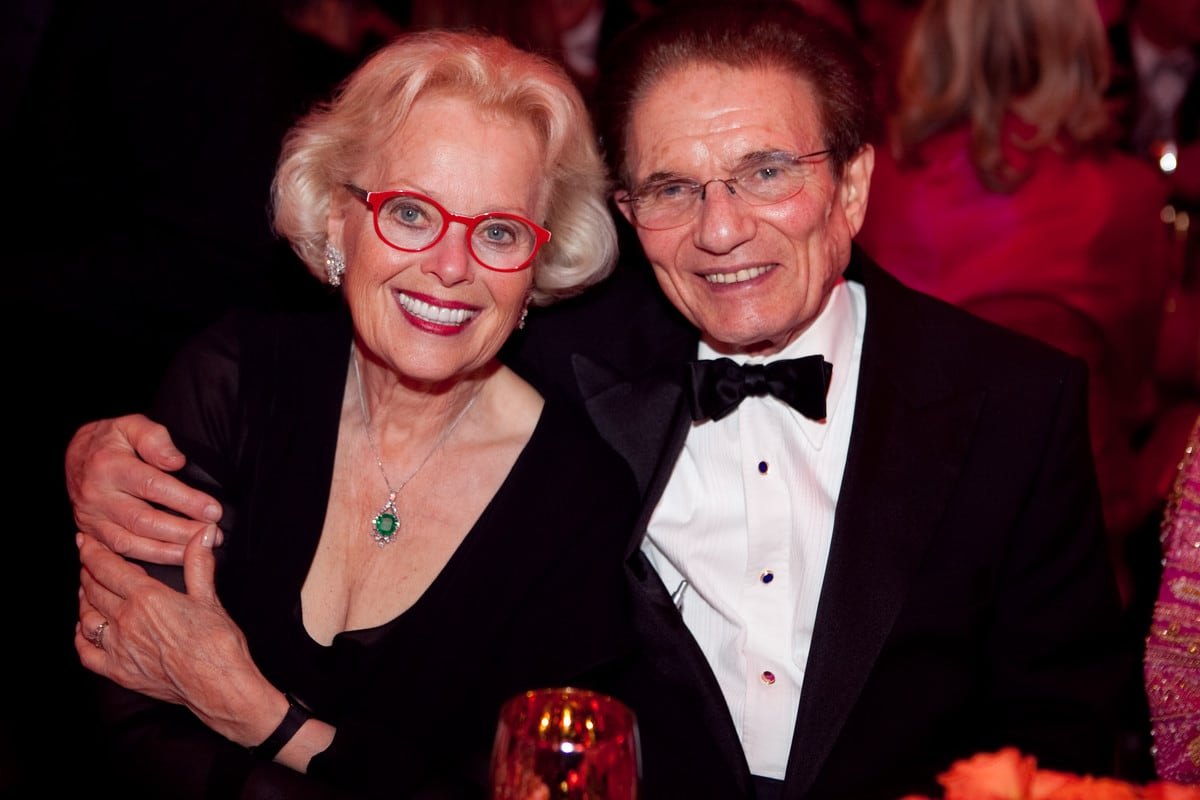 Woman and man sitting together smiling