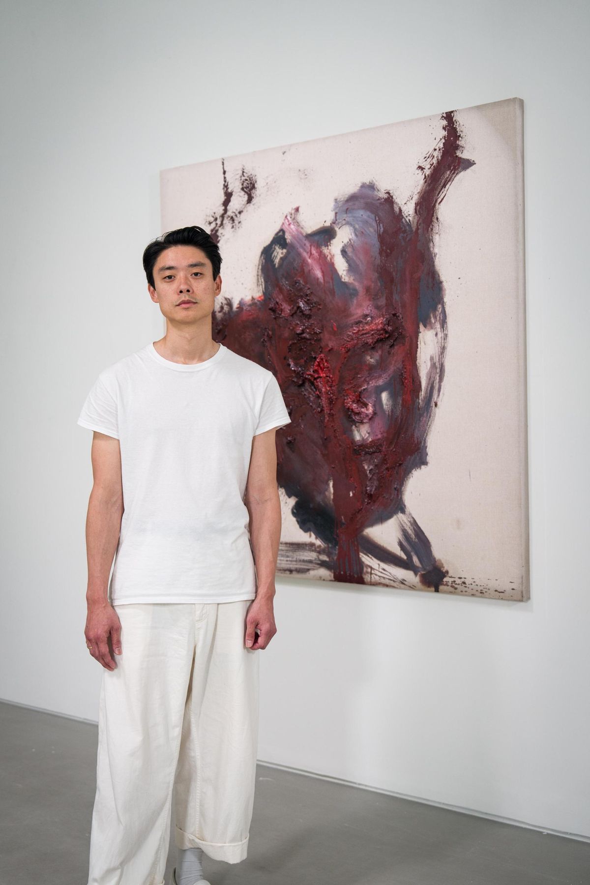 Artist Henrik Uldalen stands in front of one of his paintings at Whitestone Gallery Seoul during his solo show. Courtesy of Whitestone Gallery Seoul