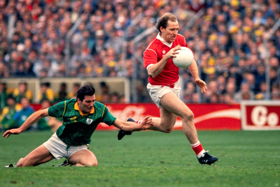 Dave Barry skips past Joe Cassells of Meath during the 1988 All-Ireland SFC final replay at Croke Park. Photo: Ray McManus/Sportsfile