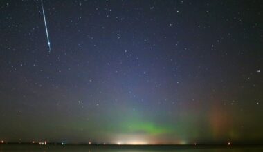 A streak of white light from a meteor graces the top left image of a blue and green starry night sky