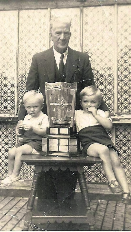 The legendary Jim ‘Tough’ Barry with Kieran and Martin Groeger and the Liam MacCarthy Cup