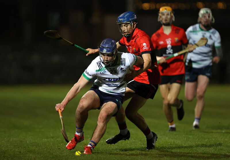  Darragh Flynn, UCC, tackles Chris Thomas, UL. Picture: Jim Coughlan.