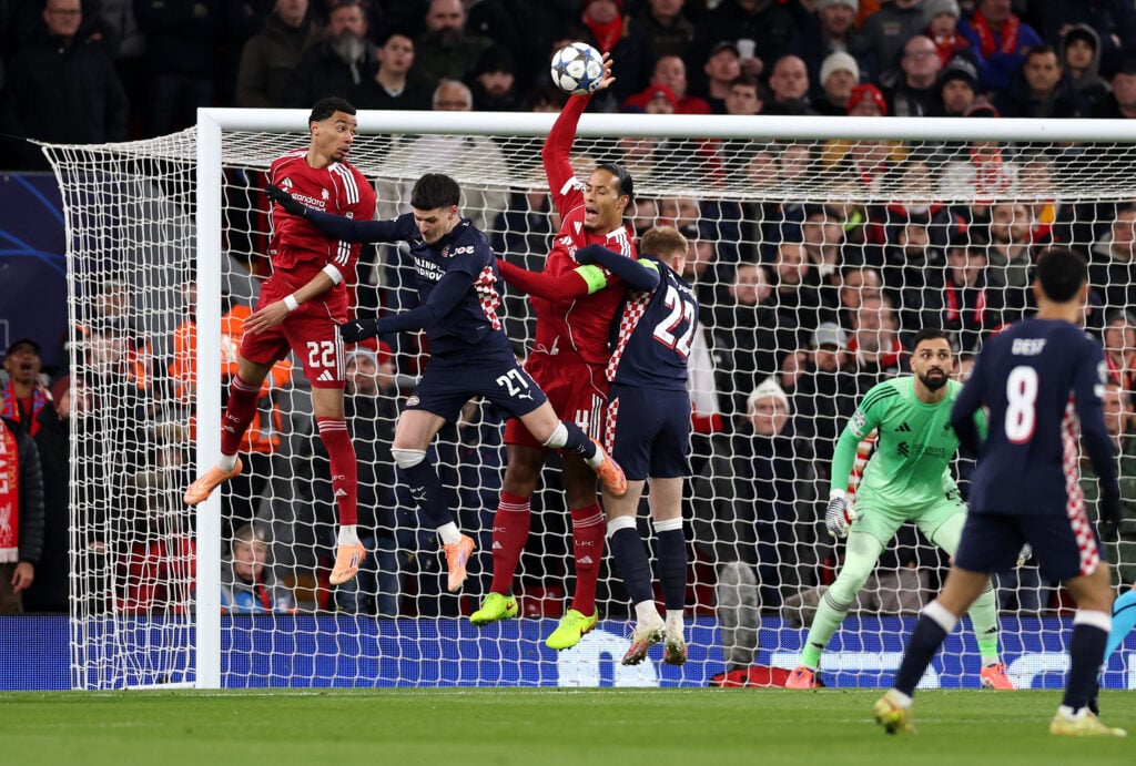 Virgil van Dijk of Liverpool handles the ball which later leads to a penalty to PSV Eindhoven during the UEFA Champions League 2025/26 League Phase MD5 match between Liverpool FC and PSV Eindhoven at Anfield