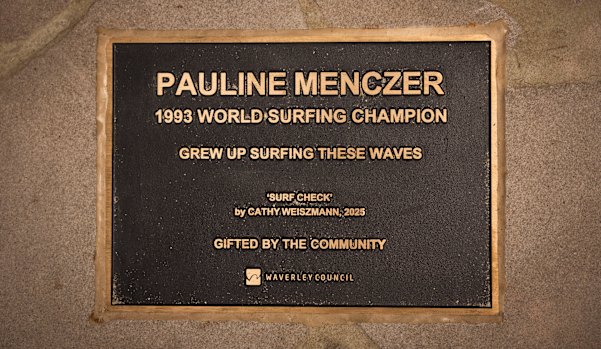 The plaque that honours Pauline Menczer by the statue.