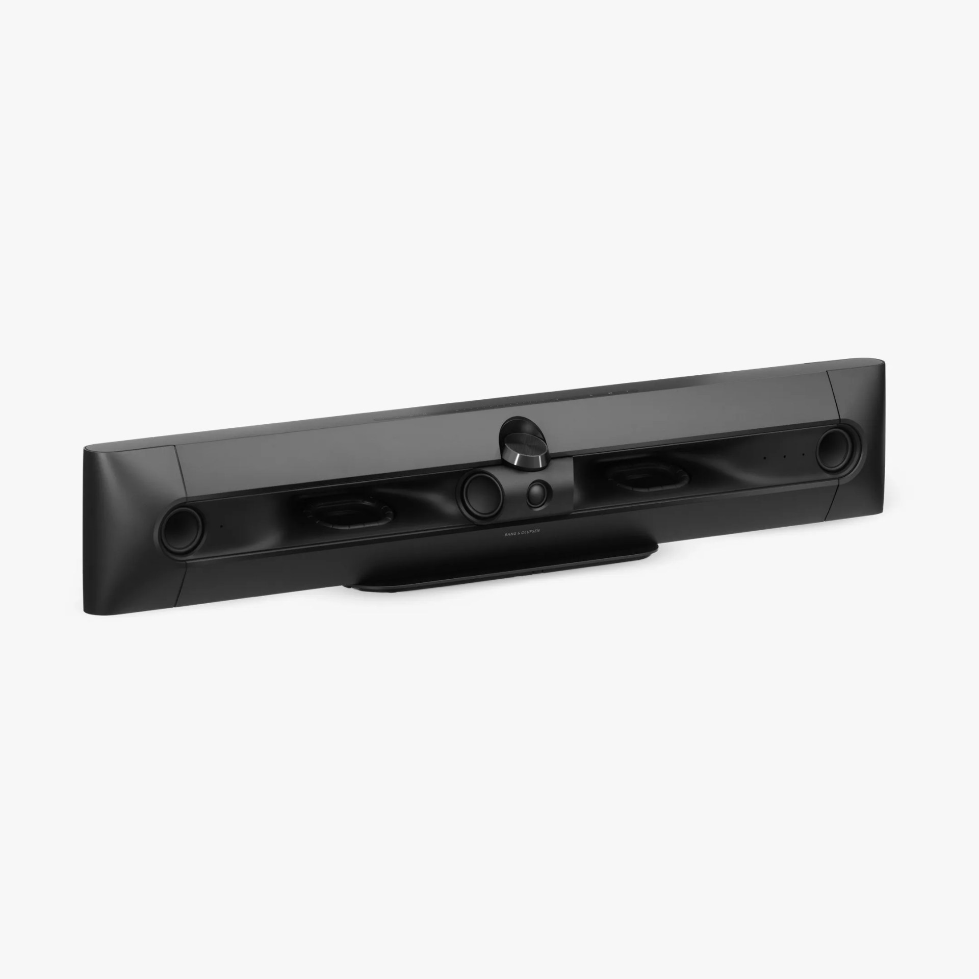 Black Bang & Olufsen soundbar with central volume knob and multiple speaker drivers.