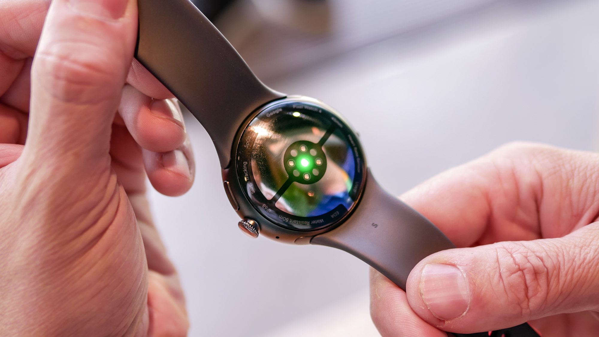 Close-up of the health sensor array on the rear of the Google Pixel Watch 4