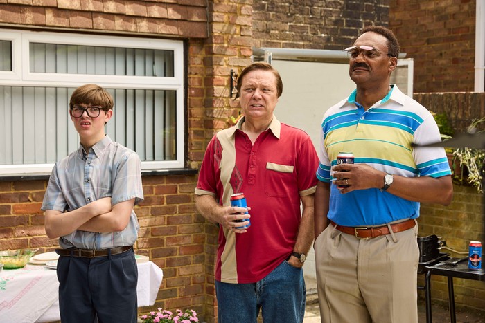 changing-ends-season-3 Oliver Savell, Shaun Dooley and Colin Salmon star in Changing Ends season 3; their characters are stood in the back garden of a residential home, where a family barbecue is being held