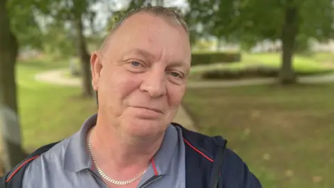 BBC John Wade in the grounds of a Derbyshire Healthcare NHS Foundation Trust site in Derby. The mental health trust supports people to deal with problem gambling. 