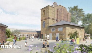 An artist's impression of a two storey brick building, with a single storey building behind it. There are flowers in the foreground and people exploring the grounds, including a wheelchair user and adults with children.