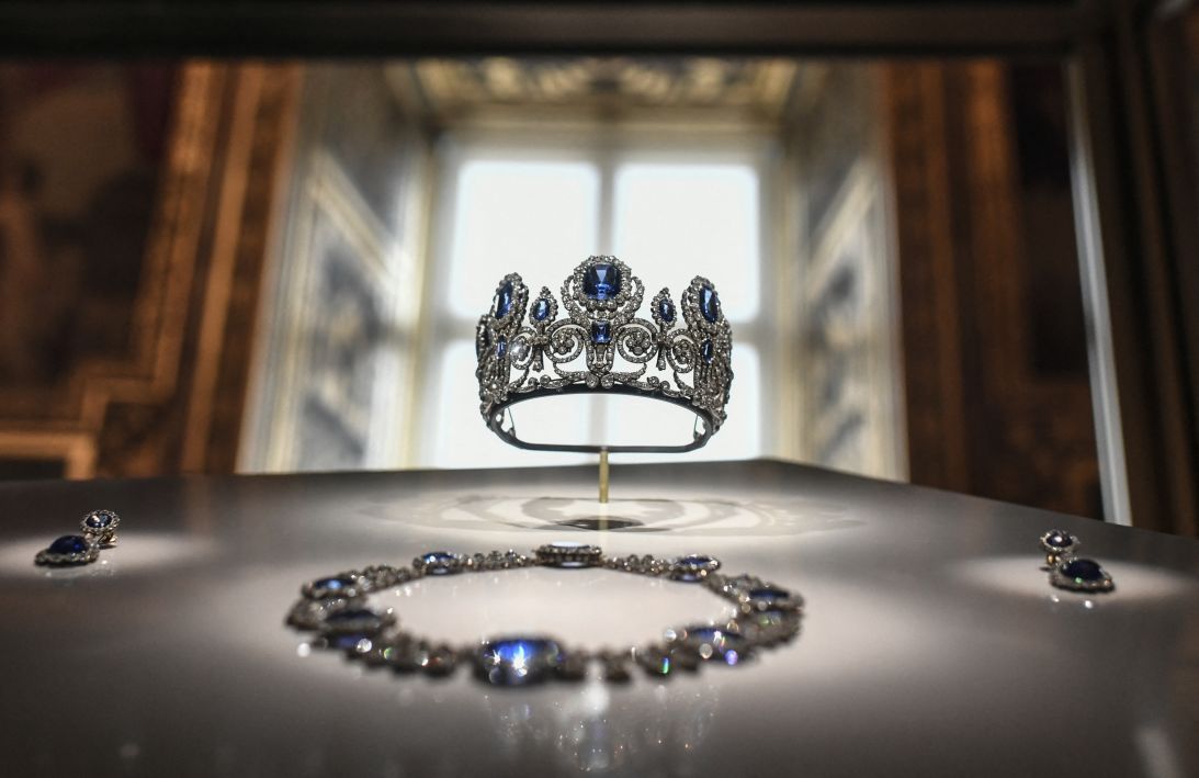 The set of jewelry worn by Queen Marie-Amélie and Queen Hortense sits on display in January 2020 inside the Louvre's Apollo Gallery.