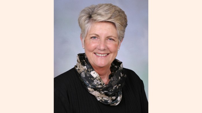 Head and shoulders photo of smiling Sharon Camp