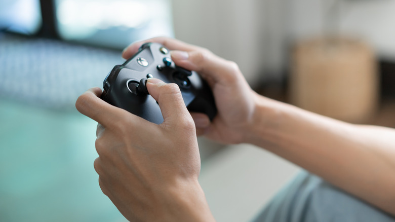 Person using a video game controller