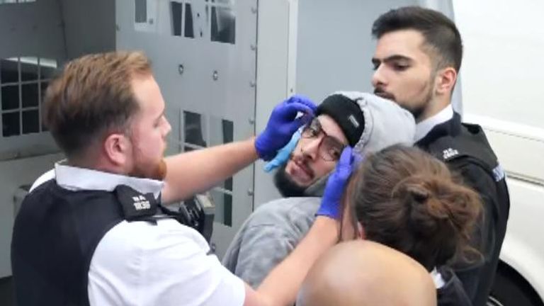 Kaddour-Cherif shouted at bystanders as officers arrested him