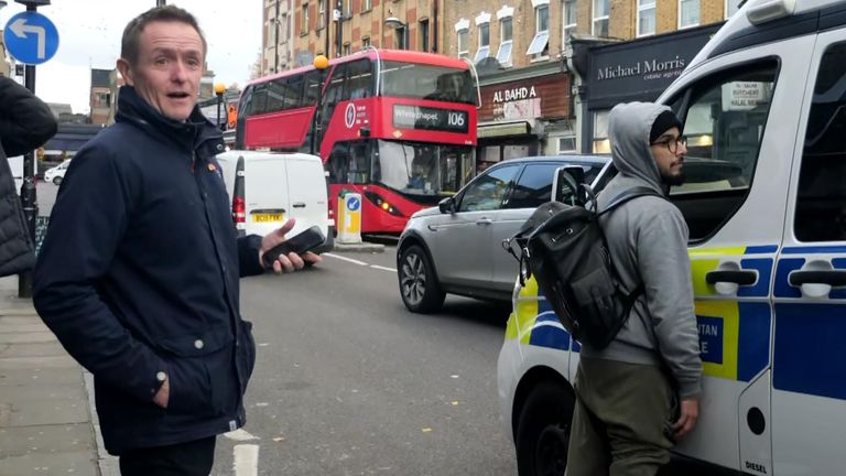 Kaddour-Cherif walked up to a nearby police van as Tom continued to question him