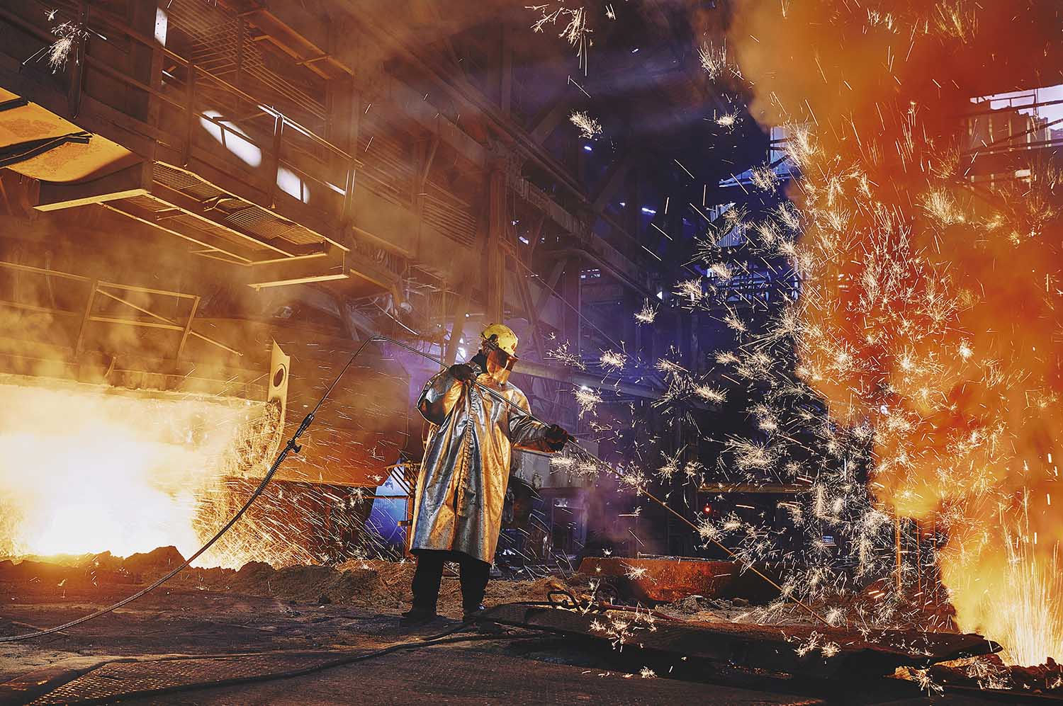 A worker in protective gear at Scunthorpe Steel Works.