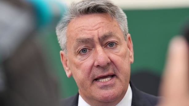 Billy Kelleher speaks to assembled media at Nemo Rangers GAA club in Cork