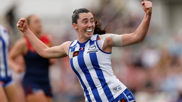MELBOURNE, AUSTRALIA - NOVEMBER 22: Blaithin Bogue of the Kangaroos celebrates a goal during the 2025 AFLW First Preliminary Final match between the North Melbourne Tasmanian Kangaroos and the Melbourne Demons at Ikon Park on November 22, 2025 in Melbourne, Australia. (Photo by Michael Willson/AFL P