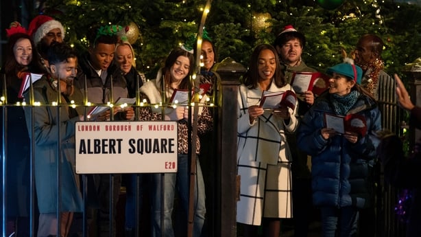 Walford is abuzz with festive spirit as the residents gather for a carol service
