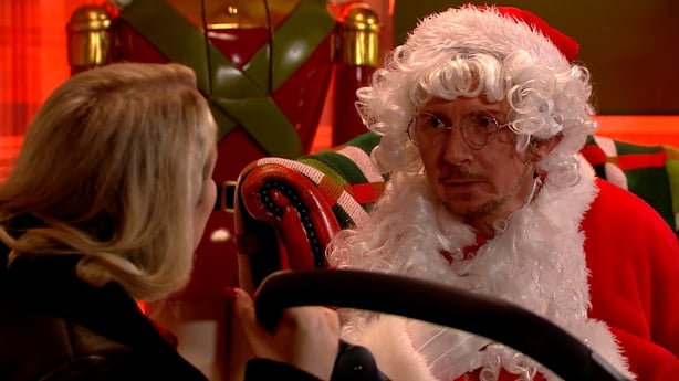 Hayley pulls down Santa's beard and James is lost for words