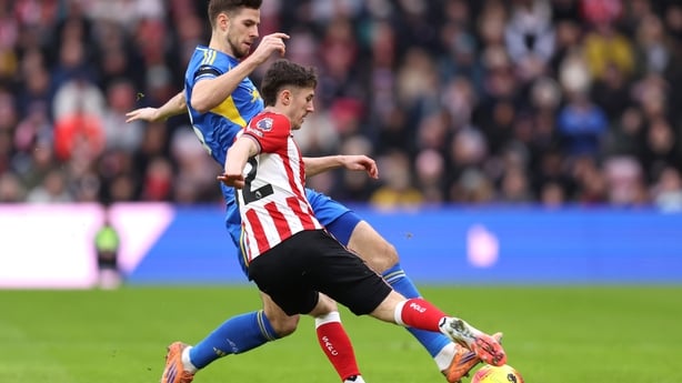 SUNDERLAND, ENGLAND - DECEMBER 28: Trai Hume of Sunderland battles for possession with Anton Stach of Leeds United during the Premier League match between Sunderland and Leeds United at Stadium of Light on December 28, 2025 in Sunderland, England. (Photo by George Wood/Getty Images)