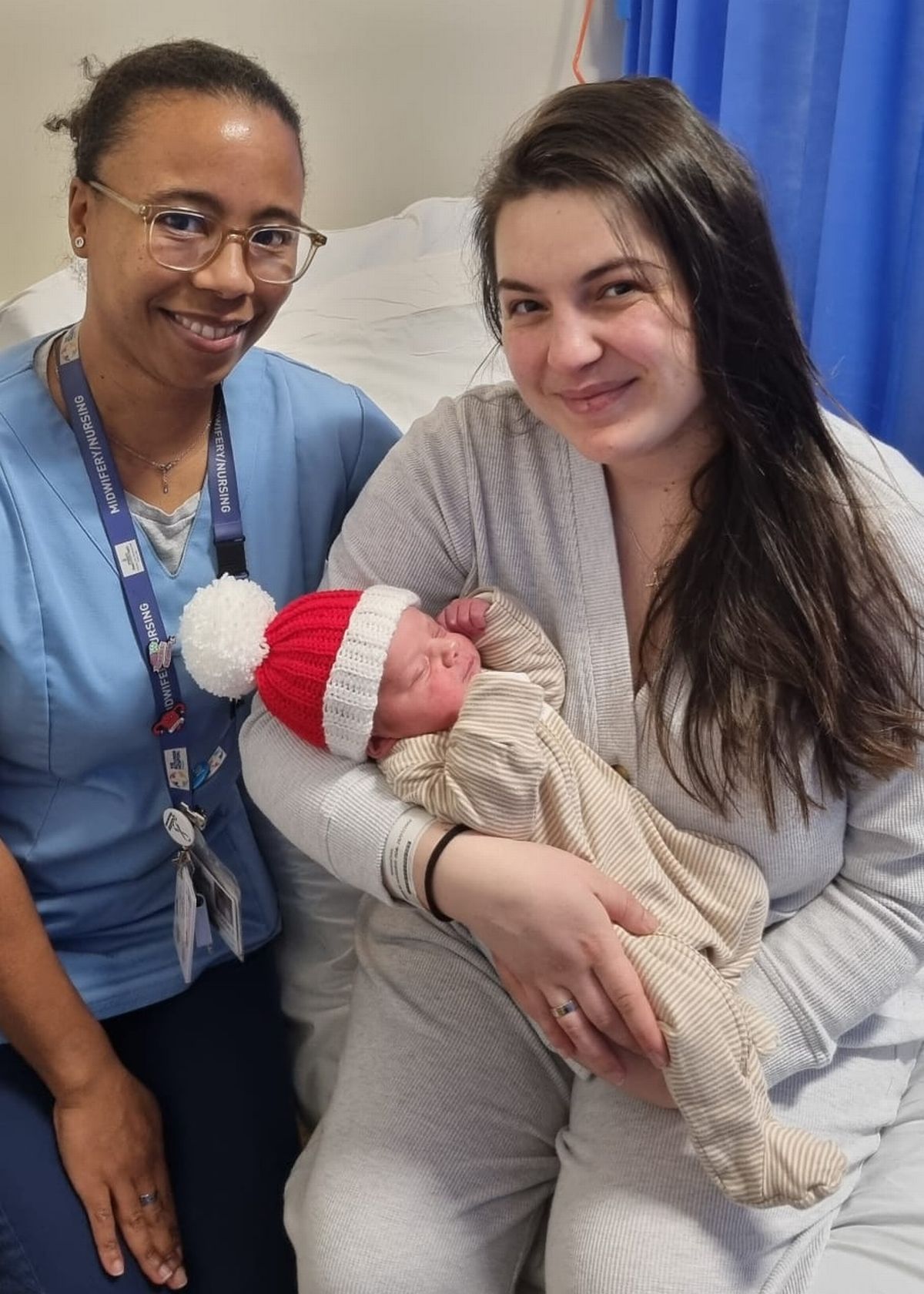 Mum Natalia Simciuc and her midwife Elsie Cotterill pose with Baby David